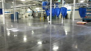 Refinishing old concrete floors with polished concrete. 