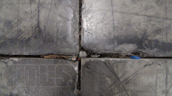 Concrete slab joint problems are common in unfilled joints.