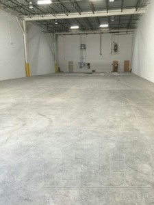 Warehouse floor cleaning services to restore concrete slabs. 