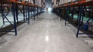 Warehouse floors are sealed with concrete sealer that is penetrating, not topical for a long lasting warehouse floor sealer. 