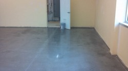 Concrete floor polishing leaves the edges unfinished.