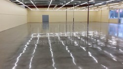 Wavy concrete floors are amplified when polished.